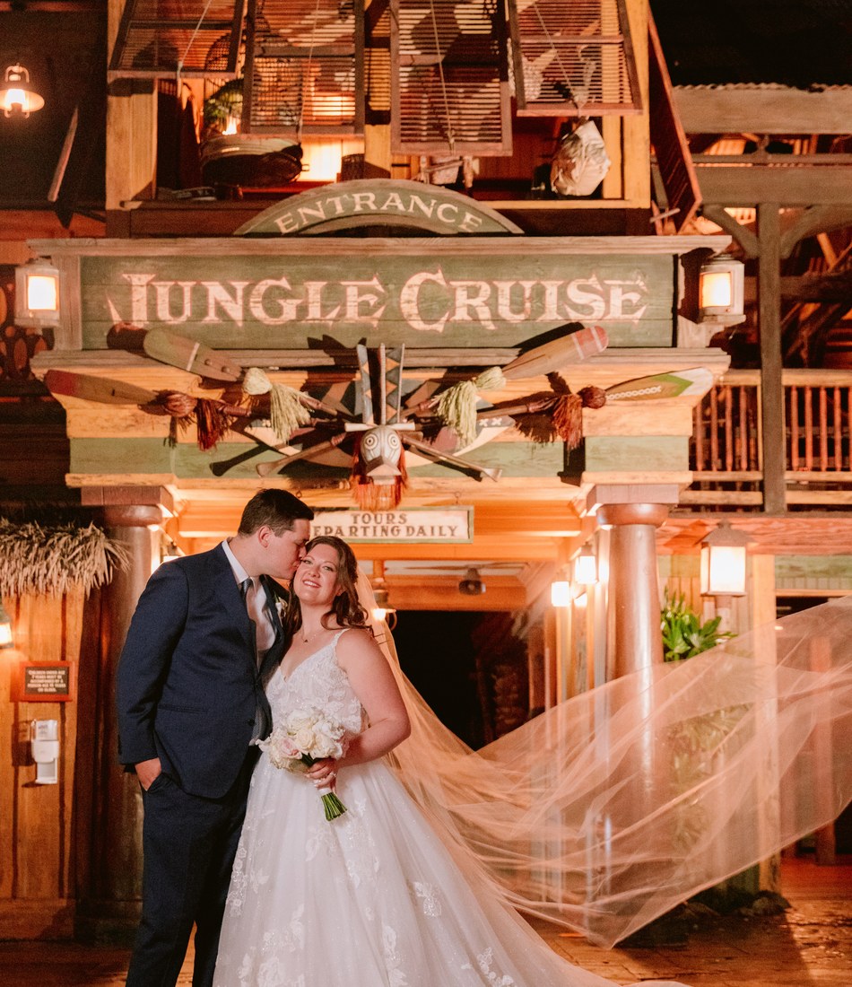 Disneyland wedding portrait under the Jungle Cruise sign